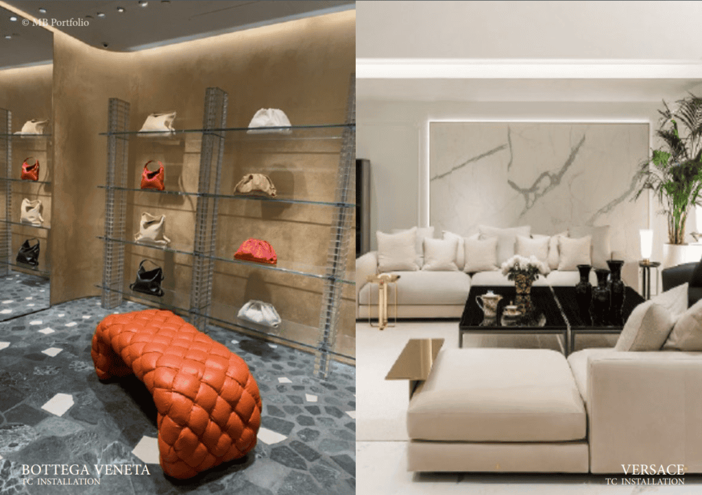 Luxury retail and living space showcasing designer products and elegant interior designs. left: bottega veneta display with bags on glass shelves and a large red leather seat. right: versace themed living room with plush sofas and a marble wall.