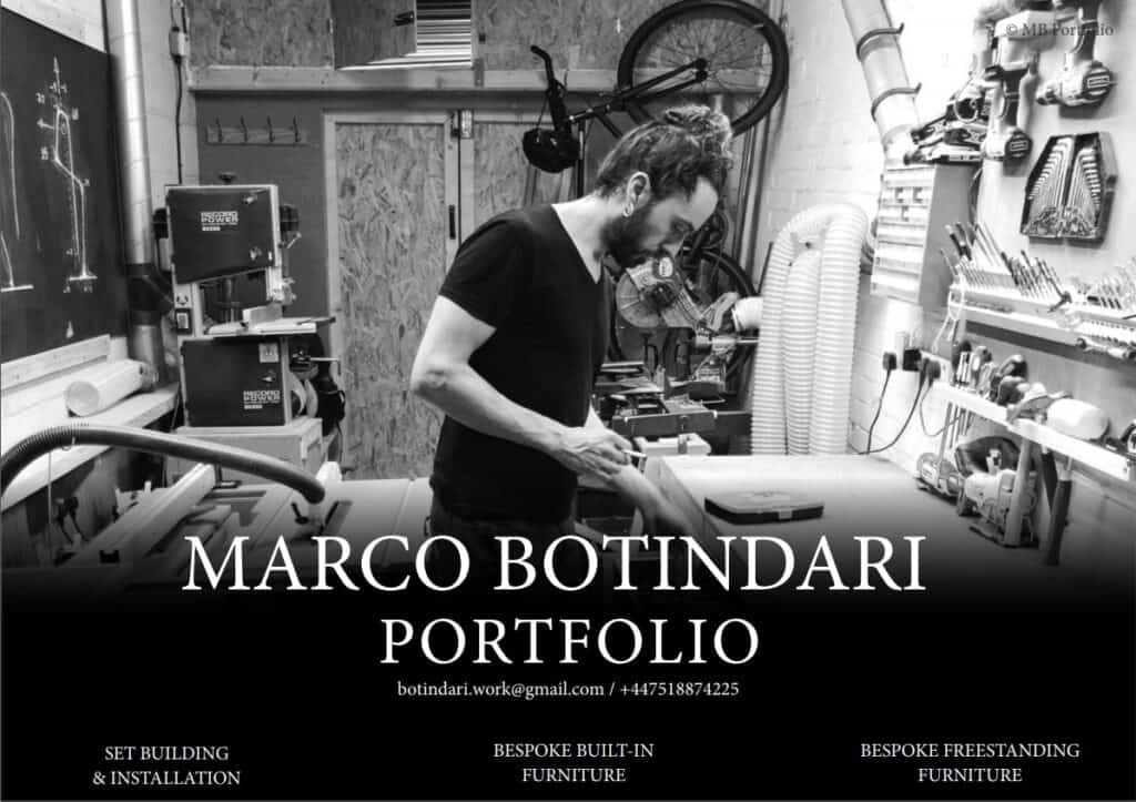 A man in a workshop, wearing a black t-shirt, is crafting furniture. tools and wood pieces are visible around him. text on the image includes the name "marco portolari" and contact information.